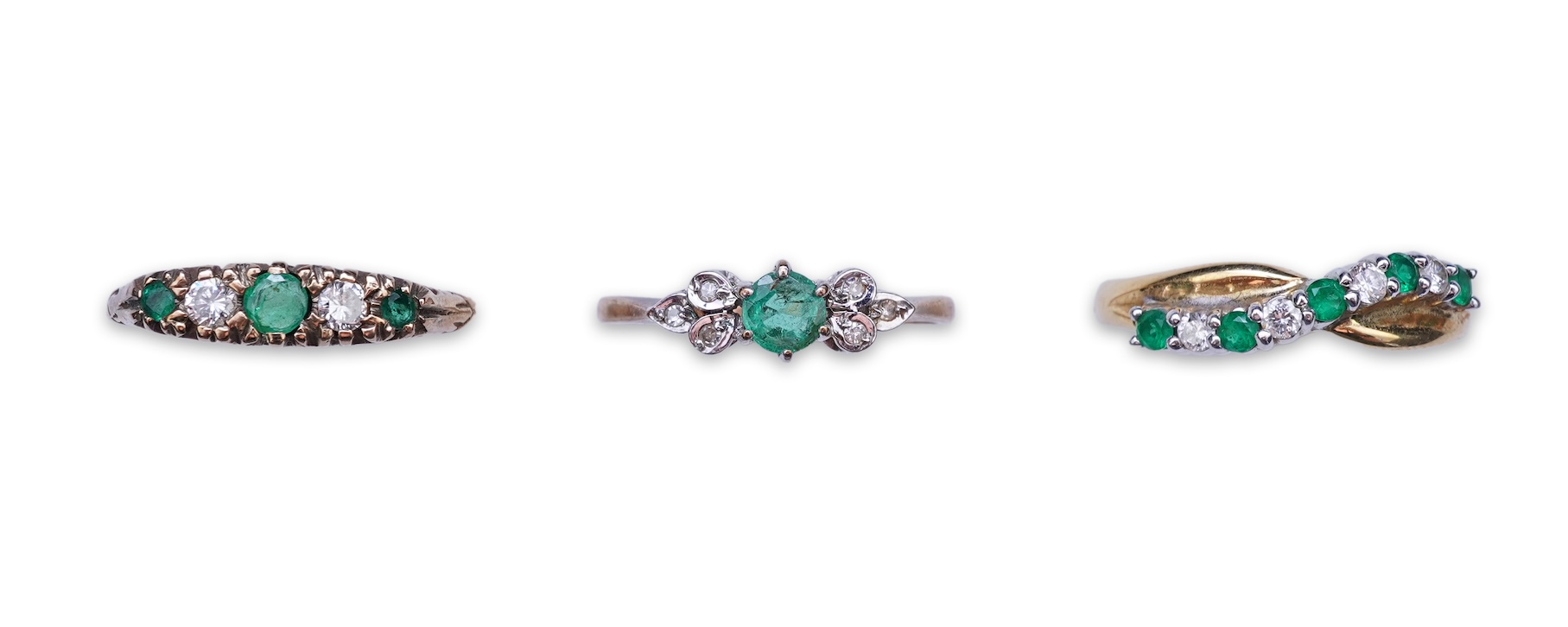 Three emerald and diamond rings